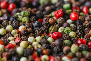 Background of different types of hot peppers .Multicolored pepper in the form of polka dots