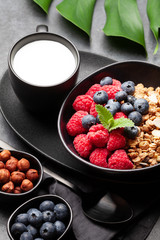 Healthy breakfast with granola, yogurt and berries