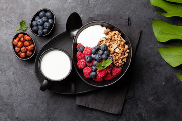 Healthy breakfast with granola, yogurt and berries