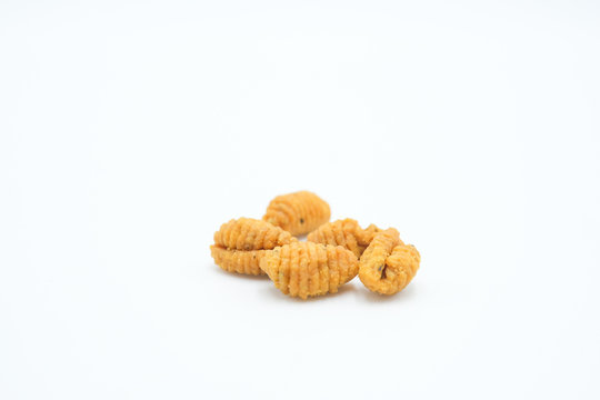 Kuih Siput , a malay traditional cuisine shot on a white isolated background.