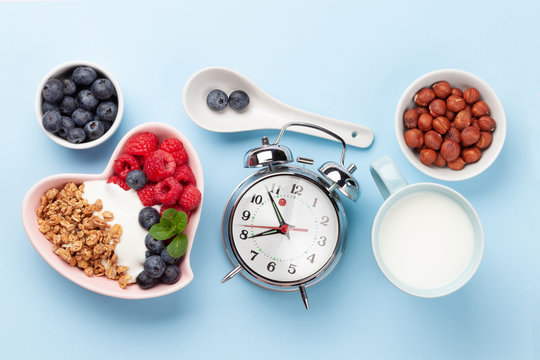 Healthy breakfast with granola, yogurt and berries