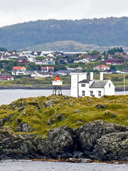 Lighthouse "Sorhaugoy fyr" on the island Tonjer at the harbor entrance of Haugesund in Norway