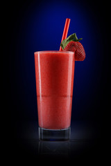 Red strawberry cocktail with pulp.