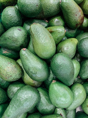 ripe green avocados for eating like a background