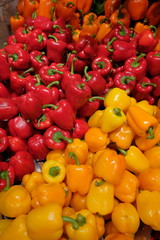Red and yellow peppers background