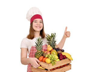 happy female cook with different fruit and thumbs up