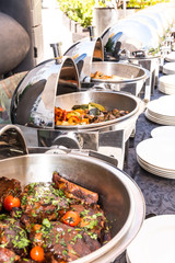 Live food stations. Kitchenware in the line catering summer brunch buffet. Corporate cocktail event