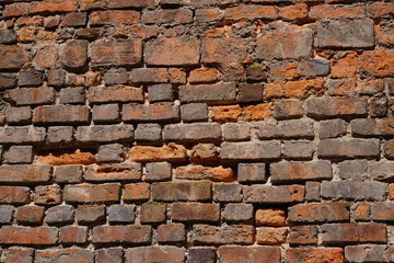 Old red brick wall texture background. Civil and industrial construction.