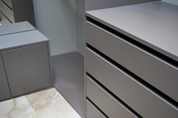 a chest of drawers for shoes in the wardrobe