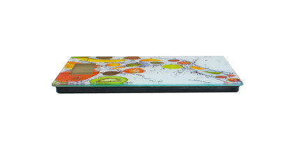 Obraz premium Isolated digital kitchen scales with pattern fruits on a white background. Top view kitchen tool.