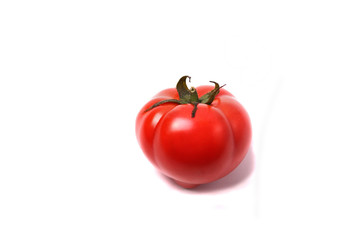 red tomatoes on white background. isolated.  close up shot