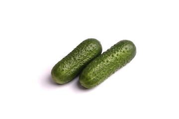 green cucumbers on the white background . isolated. close up.