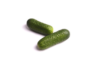 green cucumbers on the white background . isolated. close up.