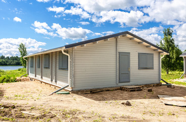 Obraz premium Construction of a new wooden house at the countryside