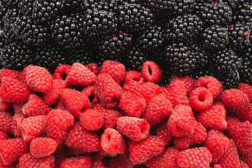 Raspberry and blueberry as a background.