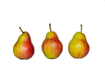 Three fresh yellow red pears, isolated on white background.