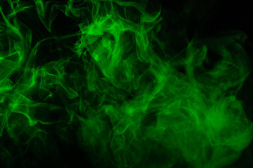 Green steam on a black background.