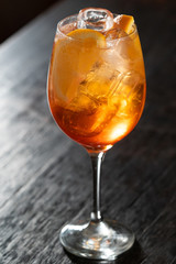Orange cup with summer cocktail