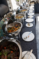 Live food stations. Kitchenware in the line catering summer brunch buffet. Corporate cocktail event