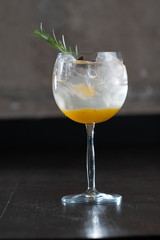 Star Anise and Rosemary cocktail, Glass on the table