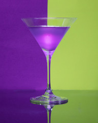 Purple kombucha in a martini glass