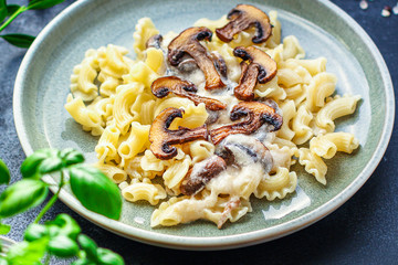 pasta creste di galla sauce with mushrooms and cream Menu concept healthy eating. food background top view copy space for text healthy eating table setting