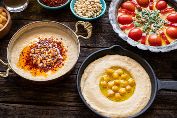 Hummus (Middle East food) on the table with top view.