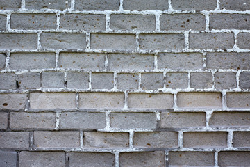  Old gray brick wall background or texture, close up.