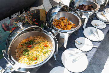Live food stations. Kitchenware in the line catering summer brunch buffet. Corporate cocktail event