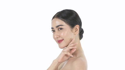Beauty concept. A beautiful woman is gently caressing her face on a white background. 4k Resolution.