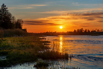 Fototapeta premium Sunset on the river. Pskov region Russia