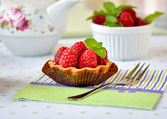 Fruit raspberry cakes on a table