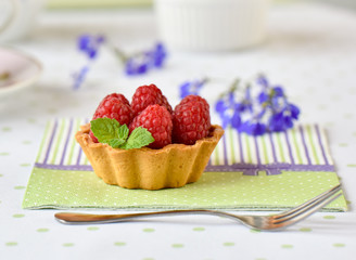Fruit raspberry cakes on a table