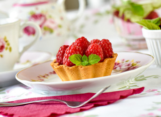 Fruit raspberry cakes on a table