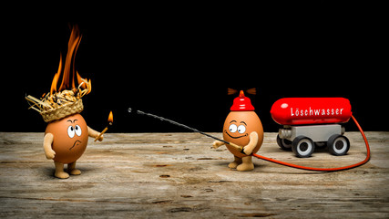 eine brennende Mütze wird gelöscht von einem Feuerwehrmann