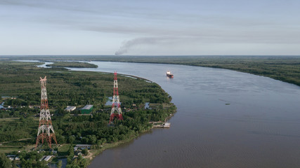 Fototapeta na wymiar Aerial view of a freighter on the parana river, the river divides argentina from brazil.