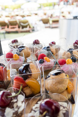 Candy bar food buffet by the pool, during hotel brunch, catering in the garden, food bloggers event