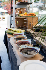 Candy bar food buffet by the pool, during hotel brunch, catering ,Chef live pancakes cooking station