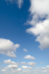 Blue summer sky white cumulus clouds background