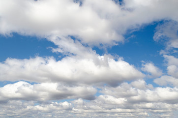 Blue summer sky white cumulus clouds background