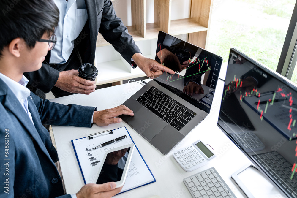 Poster business team partner working with computer, laptop, discussion and analyzing graph stock market tra
