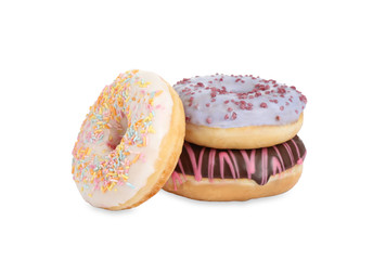 Sweet tasty glazed donuts on white background