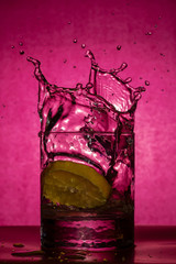 Drops from a glass of falling lemon