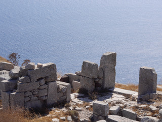 Ancient Thira (Thera) is an ancient city located on the steep rocky cape Mesa Vouno on Santorini island, Greece. The ruins of ancient buildings.
