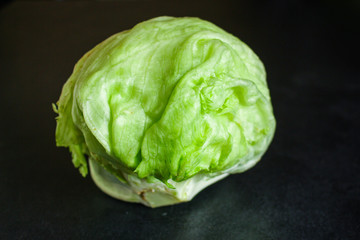 iceberg leaves  lettuce green freshness. Menu concept food background, keto or paleo diet top view. copy space for text