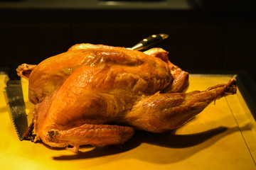 Christmas or Thanksgiving turkey on rustic wooden table