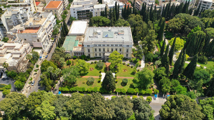 Fototapeta premium Aerial top down photo of National gardens in Amalias avenue in the heart of Athens at spring, Attica, Greece