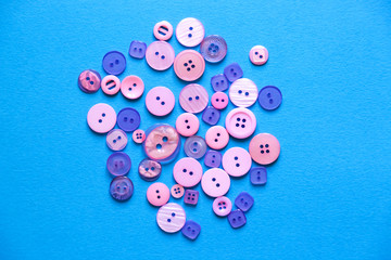 Flat lay with colorful sewing buttons, mock up, top view.