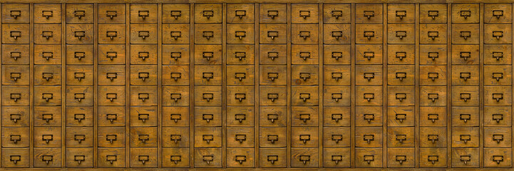 Wooden filing cabinet or organizer for storing registration cards and library accounting. Wooden document repository in past centuries, pre-computer era and big data. Seamless old wooden file cabinet.