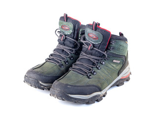 Pair of used hiking boots isolate on white background